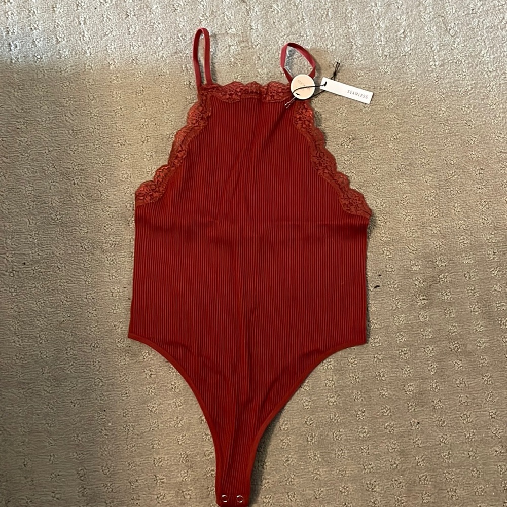 Woman’s NEW bodysuit